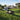 AI powered robotic lawn mower maintaining a healthy lawn with intelligent navigation